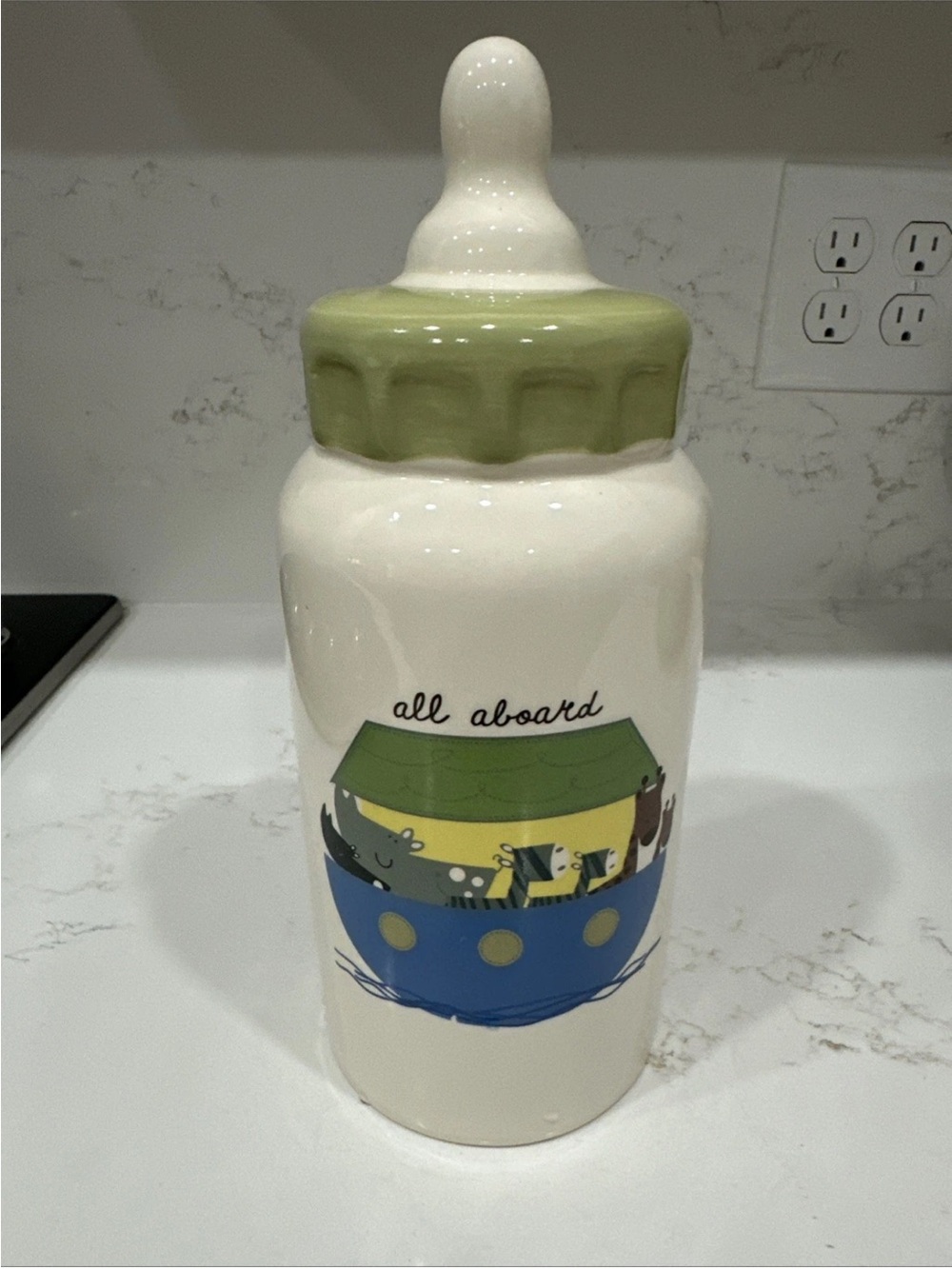 NOAHS ARK  CERAMIC BABY BOTTLE SHAPED COIN  BANK